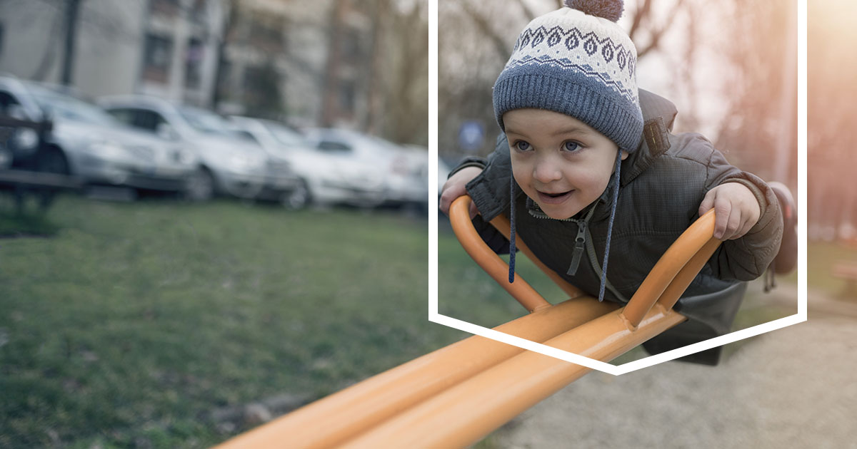 Child rebalancing on a seesaw