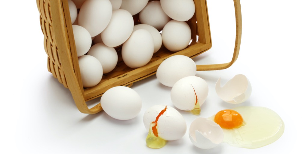 Eggs spilling out of a basket.