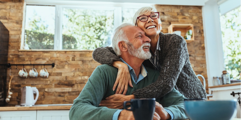 Couple Smiling and Hugging