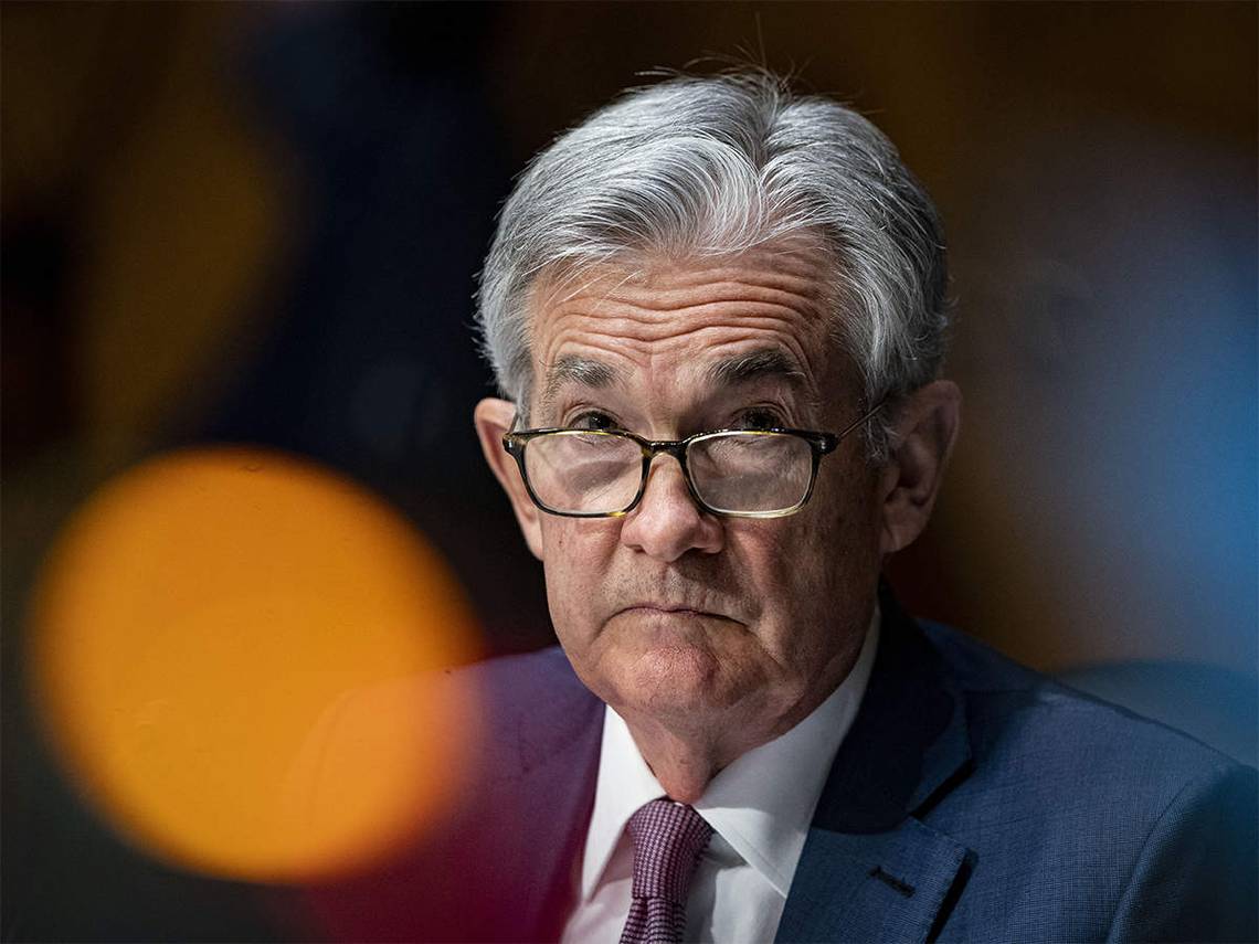 Federal Reserve Chairman Jerome Powell with a serious l