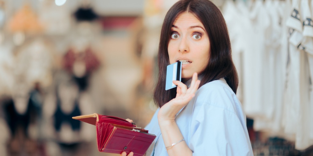 Stressed shopper having her credit card declined