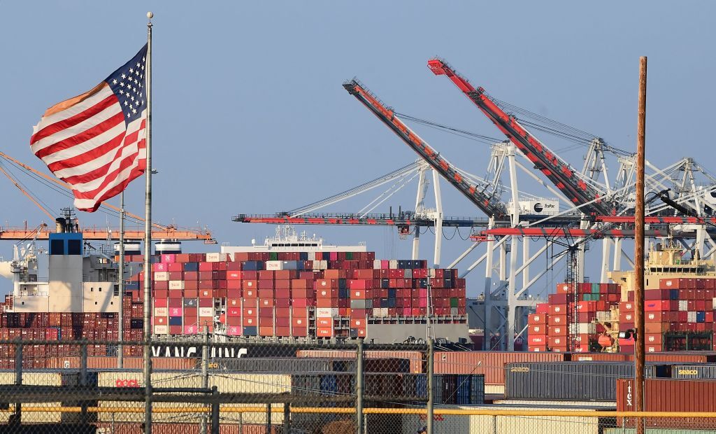 Container ship filled with containers and the American 