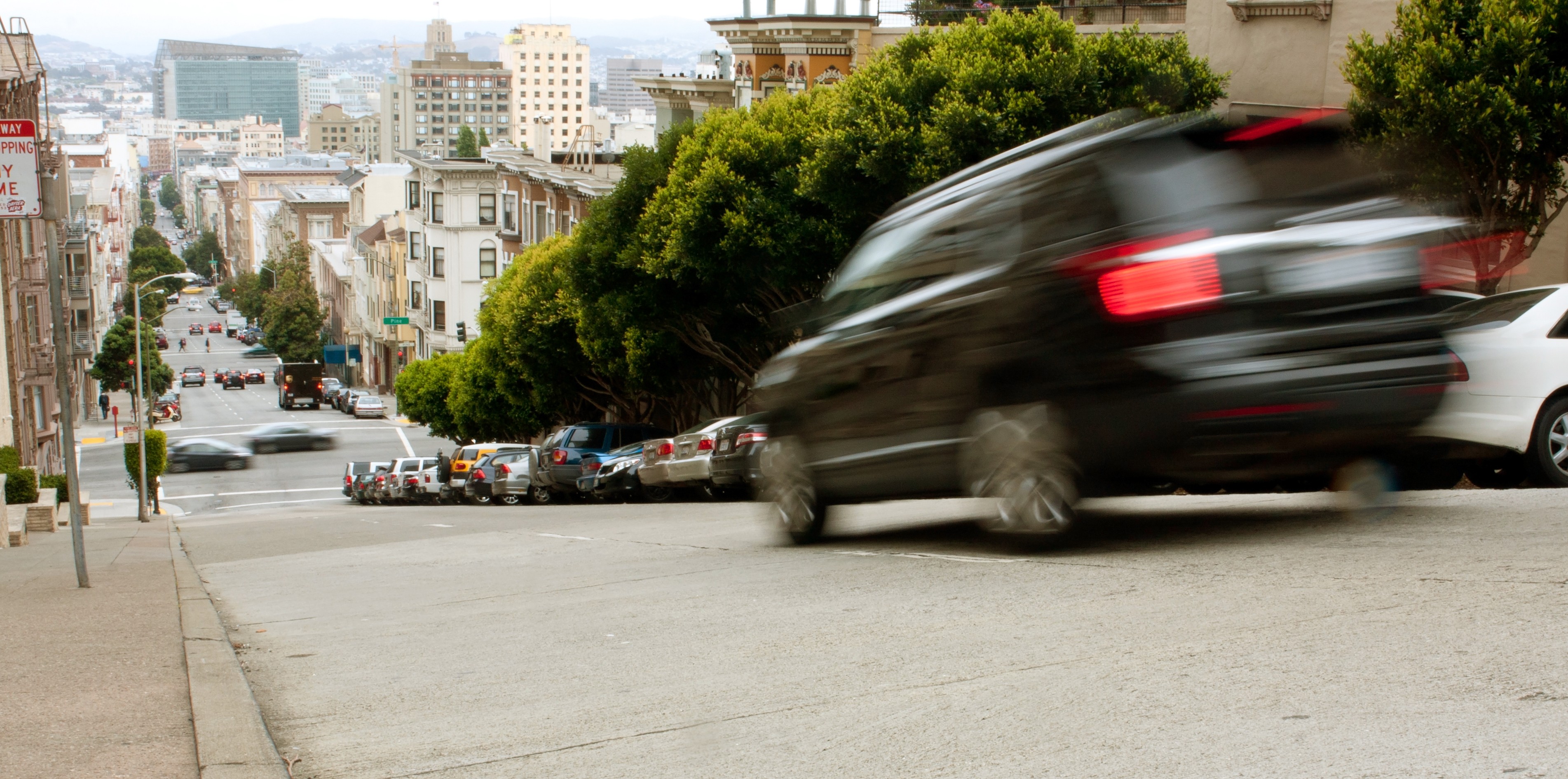 Car braking on a steep street