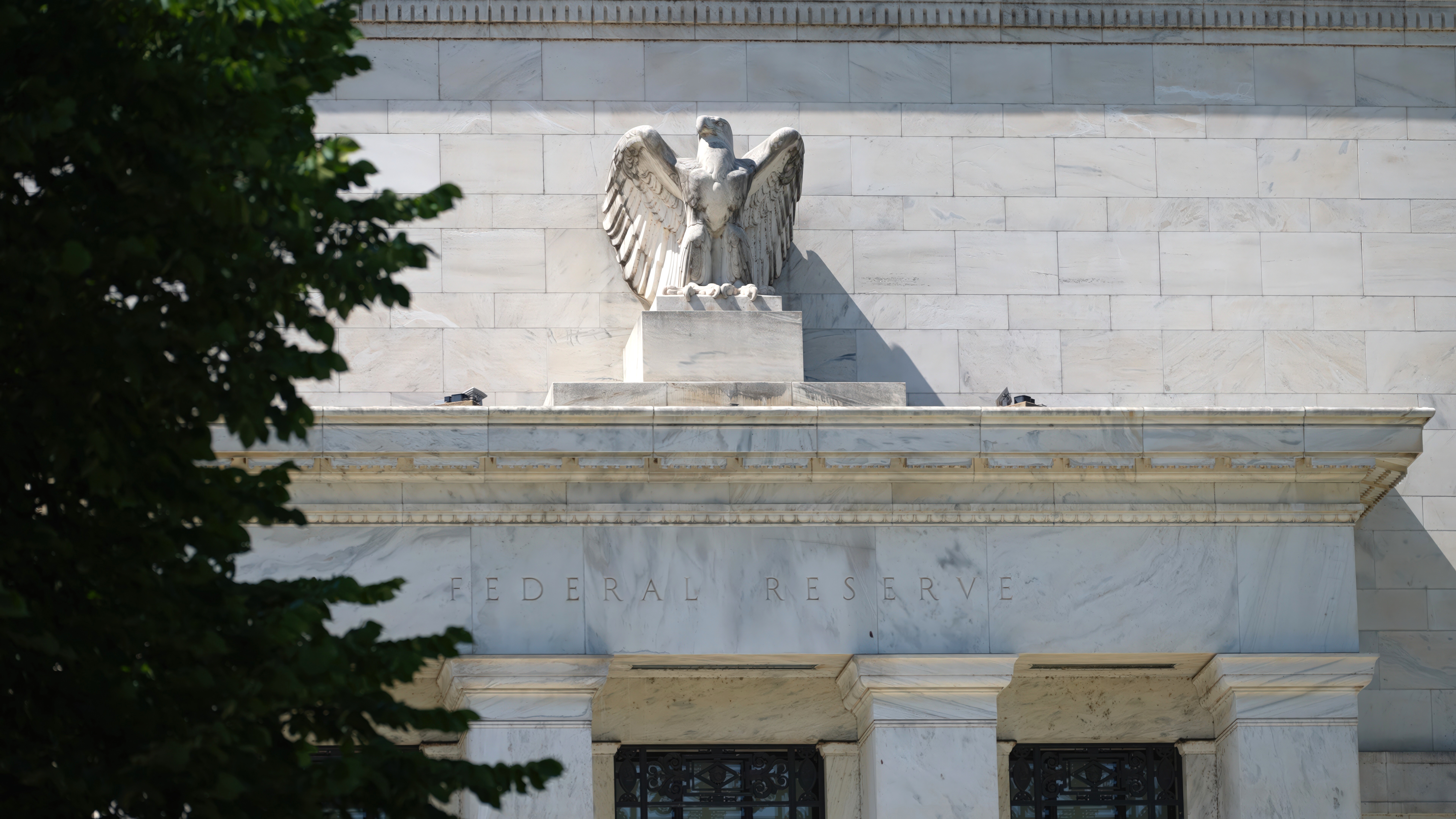 American Eagle perched on the Federal Reserve Building