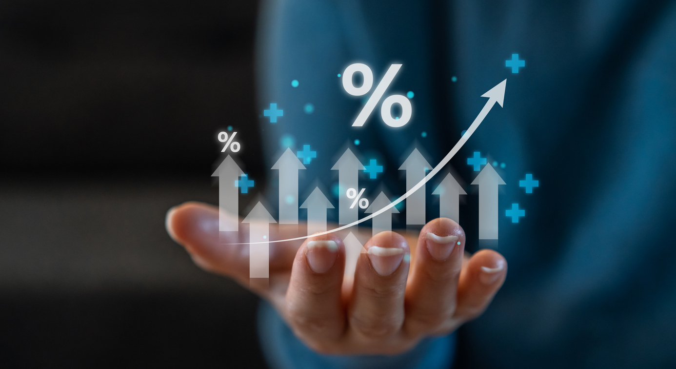 Human holding interest rate dividend arrow business fin